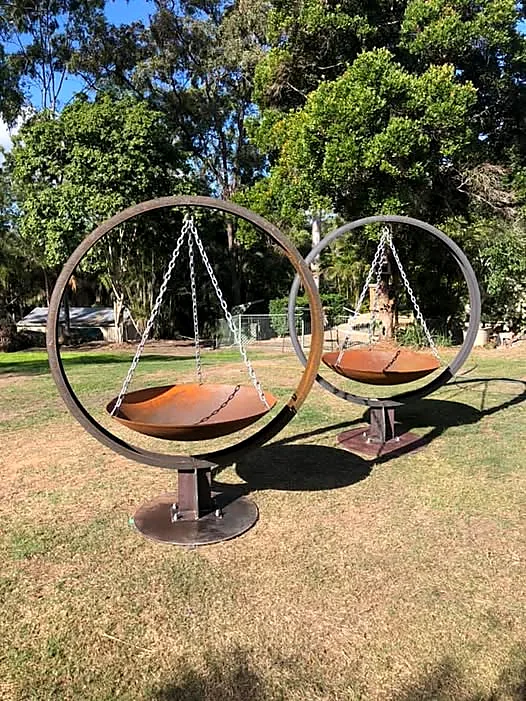 Two custom suspended fire pits ready for delivery